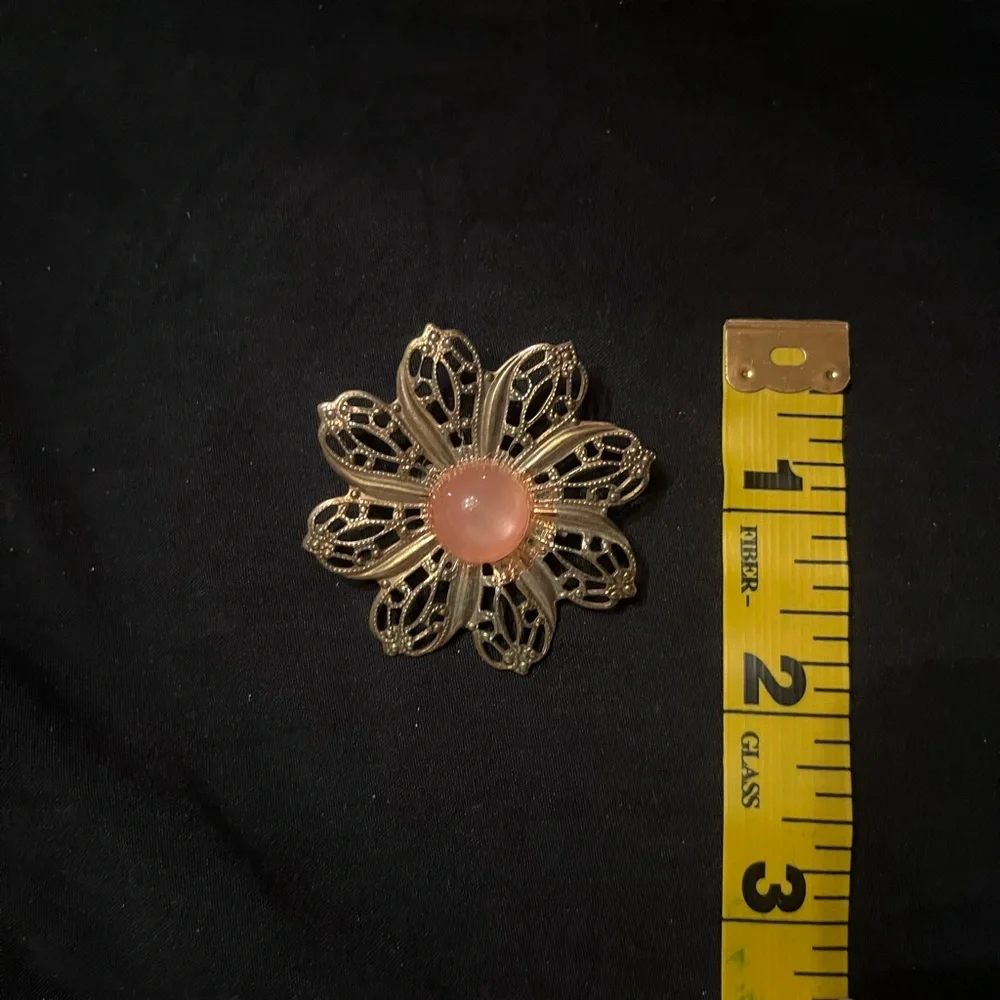 Vintage Gold Tone Filigree Brooch with pink stone center